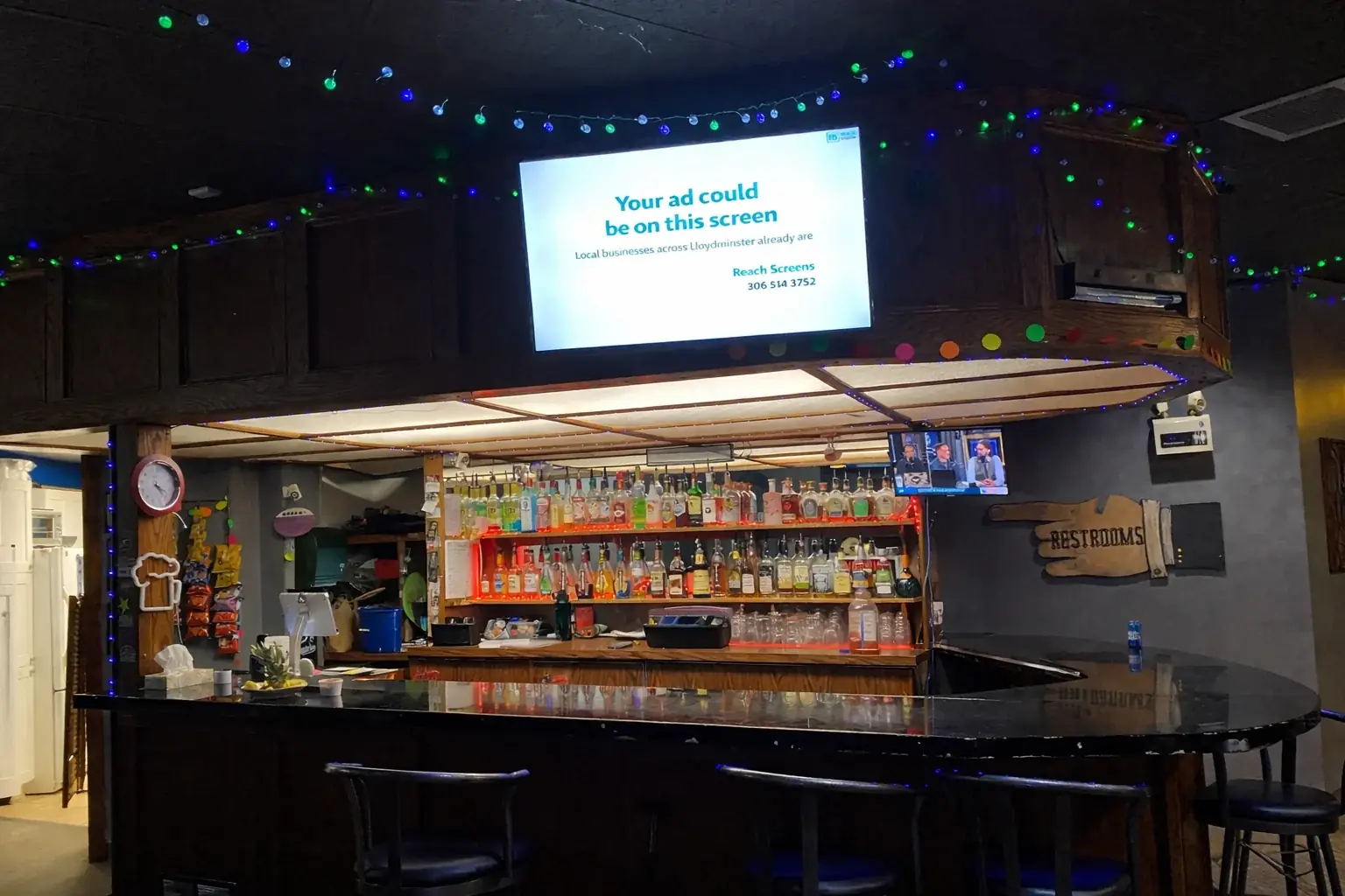 Pub and lounge with a Reach Screens display