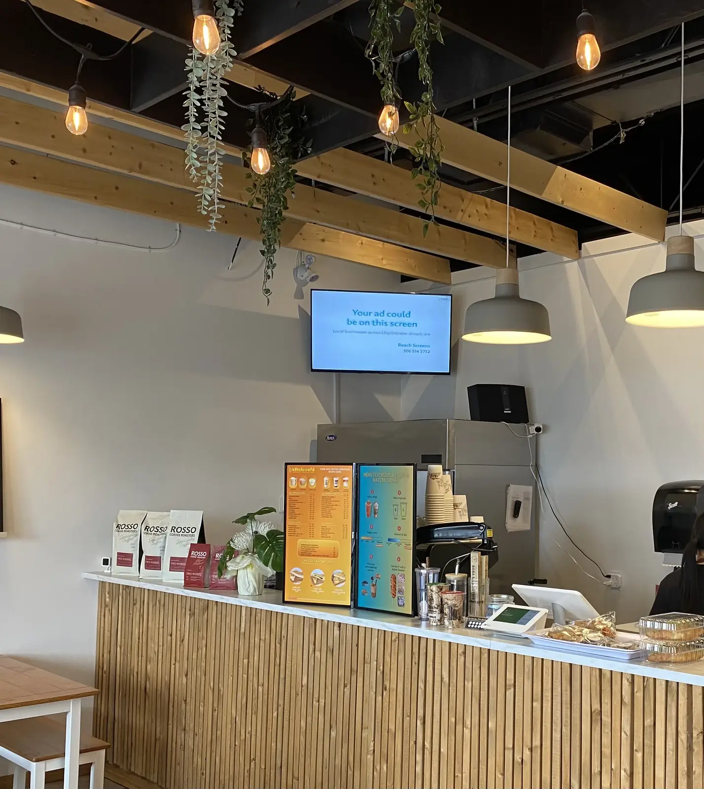 A Reach Screens display in a coffee shop