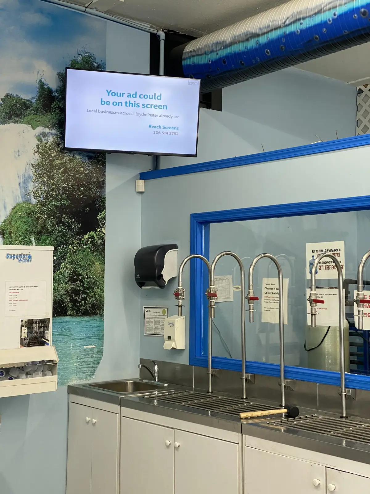 Water refill station with display